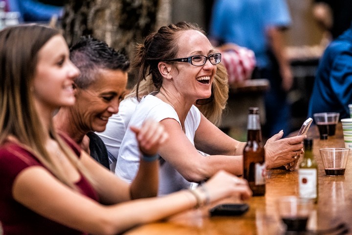 a group of people sitting at a table