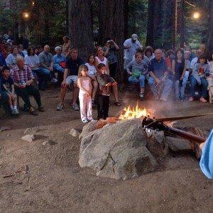 a group of people walking in front of a crowd
