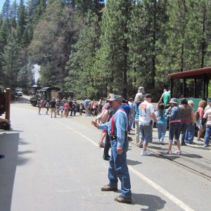 a group of people walking down a road