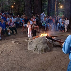 a group of people standing in front of a crowd