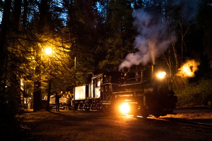 a train on the tracks at night