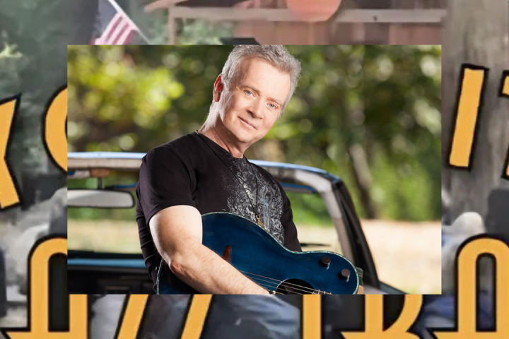 Peter White sitting on a bench