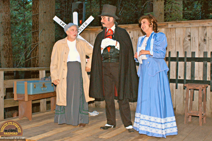 a group of people standing next to a fence